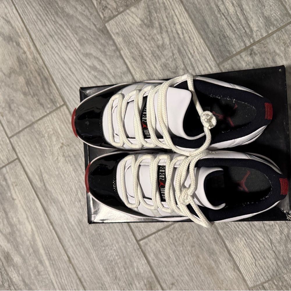 Jordan Black and White Sneakers with Red Accents